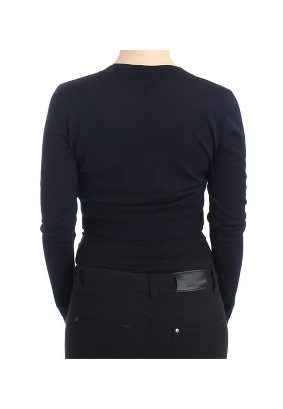 Brand: Class Roberto Cavalli
  Material: 100% Virgin Wool
  Color: Blue
  Style: Cropped Cardigan
  Button closure in the front
  Logo details
  Original tags and store bag included
  Gender: Women