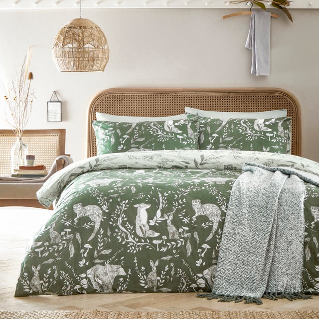 Explore our cosy and delicate take on the beauty of woodland creatures as you rest in the Buckthorn duvet cover set. Hand-drawn rabbits, foxes and bears pose among the delicate florals, which are set on an earth toned background. Flip the set over and the same design appears, but this time in inverted colours, giving you a fresh, evergreen look. An adorable and down to earth addition to your bedroom.