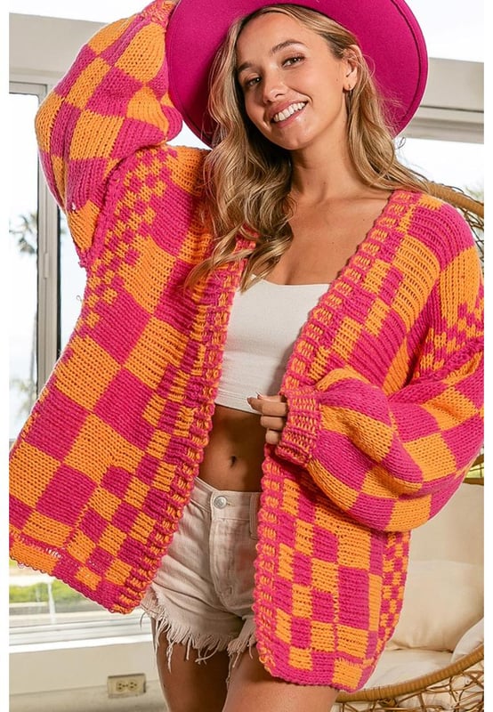 Cozy and chic multicolor cardigan
  Trendy open-front design
  Stylish mixed checkered pattern
  Perfect for upgrading your fall wardrobe
  Adds a modern and sophisticated touch to any outfit
  A must-have for the fashion-forward woman
Material: 100% Acrylic