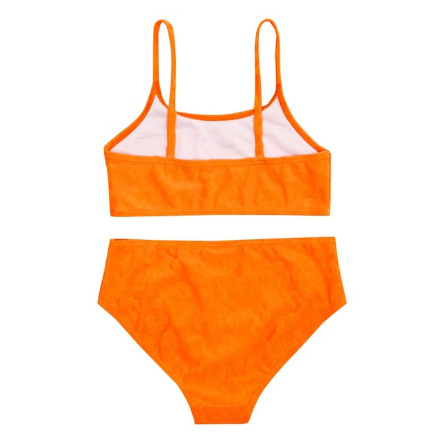 Regatta Girls Dakaria II Floral Bikini Set (Satsuma) 96% Polyester, 4% Elastane. Fabric: Stretch, Towelling. Design: Floral, Raised Texture. Fastening: Pull-On. Neckline: Scoop. Fabric Technology: Durable. Contents: 1 Swim Shorts, 1 Swim Top. Please Note: Light Foam Cups In Sizes 13yrs+. Sustainability: Made from Recycled Materials. Sleeve-Type: Sleeveless. Sun Rating: UPF 50+.