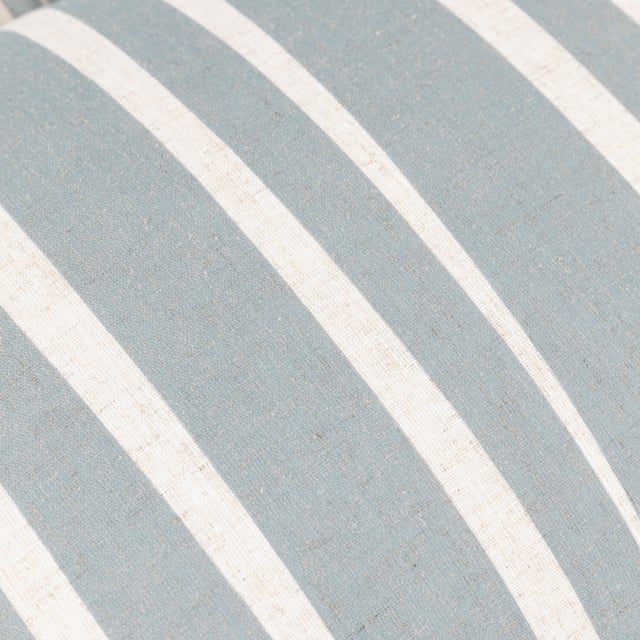 Bring a touch of elegance and warmth to your living space with the Carmon Cushion. Crafted with a linen-look texture and featuring a relaxed vertical stripe pattern, this cushion exudes a refined yet inviting charm. The ruffle trim adds a sophisticated flair, making it a standout piece for those who value unique home accents. Its plain reverse offers versatility, seamlessly blending with any decor style. Ideal for those who appreciate style and quality, the Carmon cushion is designed to express your individuality and impress your guests.