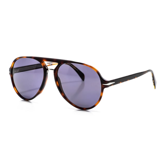 7005S sunglasses with acetate frame.

 Shape and design:
 - These David Beckham glasses have an aviator silhouette.

 Frame material:
 - The frame of these glasses is made of acetate, a plastic material.
 - Acetate provides durability, flexibility and a smooth finish to the frame.

 Acetate temples:
 - The temples are also made of acetate, matching the frame material.
 - The acetate in the temples makes them light and comfortable to wear.

 Brand details:
 - DB brand engraving on the lens.
 - These design elements help to clearly identify the model as part of the David Beckham eyewear collection.

 Glasses:
 - The lenses are of high quality.
 - These lenses provide excellent UV protection and sharp, clear vision.
 Measures: Lens height: 52 mm. Lens width: 57 mm. Bridge: 17 mm. Temples: 145 mm.
 Composition: Acetate
 Care:
Use a soft, clean microfiber cloth to clean your sunglasses. This type of cloth will not scratch the lenses.
 Avoid using abrasive cleaning products, detergents, alcohol or acetone, as they can damage lenses and anti-reflective treatments.