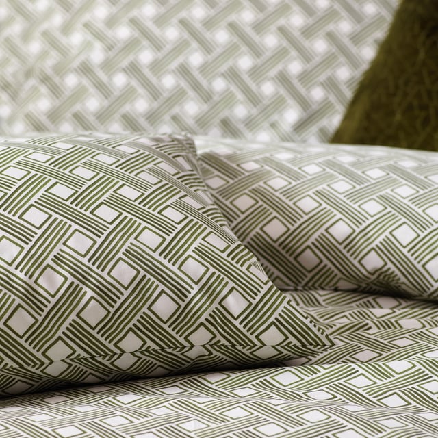 Inspired by modern, minimalist art, the Alexa duvet cover set is a softer alternative to geometric design. Featuring watercolour basket weave lines in earthy green tones, it will add warming, relaxing colour to a neutral interior. Printed on soft, cotton rich fabric, the design is featured on both sides. A timeless addition to your bedding collection! OEKO-TEX certifies this product® showing it has been sustainably made.