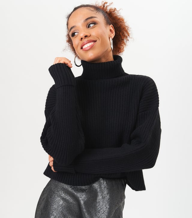 Stay cozy and stylish this season with our High Neck Chunky Knit Crop Jumper. Made with high quality materials, this jumper will keep you warm and on trend. The high neck adds a touch of fashion while the chunky knit provides both comfort and durability. Perfect for layering or wearing on its own, this jumper will be a staple in your wardrobe.MeasurementApprox. length- 60 cm