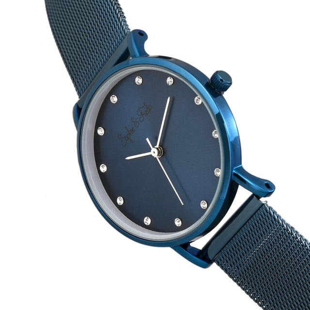 Polished Alloy Case ; Precision Japanese Quartz Movement ; Non-Glare Scratch-Resistant Mineral Crystal ; 12 Swarovski Crystal Markers on Dial; Logo-Engraved Stainless Steel Caseback ; Mesh Alloy Bracelet; Box with Tongue and Safety Clasp; 32mm Case Diameter ; 3 ATM Water Resistance;
