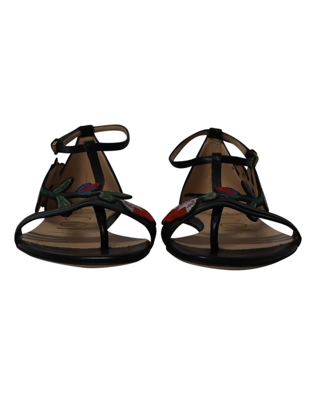 VINTAGE, RRP AS NEW
Wear luxury with a touch of high-fashion by choosing these black flats from Gucci. They are crafted from leather in an open toe T-strap silhouette and detailed with floral embroidered patches that extend from the vamps to the counters. They are complete with buckled ankle straps and comfortable leather-lined insoles.

Gucci Ophelia Floral-Embroidered Flat Sandals in Black Leather 
Material: Leather
Color: Black
Size: IT35/UK2
Condition: Excellent
Sign of wear: No
SKU: 252653