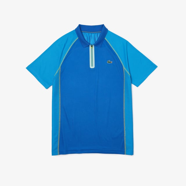 Performance & Assets Players The player’s offer is the perfect outfit to perform on court. It’s a mix of heritage’ Lacoste design and technical fabrics. Regular fit: natural ease on body Team Lacoste Players' polo dedicated to ATP tournaments New light piqué knit for a maximum of comfort during your matches under high temperatures Functional mesh panels at sides and back for breathability Ultradry property : moisture management performance you need to play at your best Eco responsible fabric : recycled polyester Contrasted flat seams in order to reduce skin irritation when you play New green silicone crocodile New grand tournament Lacoste wording at back neckline with herringbone effect