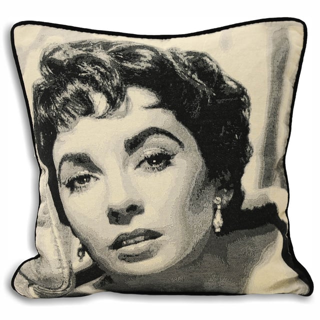 Featuring a jacquard weave of Elizabeth Taylor. Coordinated with a contrasting piped trim, this cushion will have pride of place on your sofa.