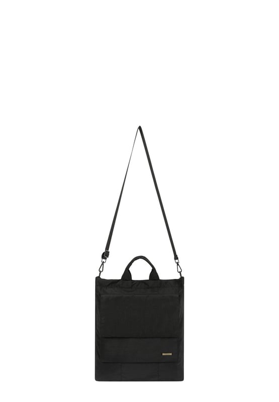Made from our signature nylon, the Portrait Nylon Tote is the perfect way to carry all your everyday essentials. Featuring a padded carry handle and adjustable crossbody strap with a clip off function. Features: , Zip top opening, Front oversized flap over zip pocket, Rear zip pocket, SMITH & CANOVA antique brass logo, Branded antique brass zips, Padded grab handle, Adjustable crossbody strap (detachable), Internal 15 inch padded laptop sleeve, Internal zip pocket, 2 Internal mobile phone slip pockets - fits normal and plus size smart phones, 2 Internal pen slip pockets Style Ref: 92682 BLACK