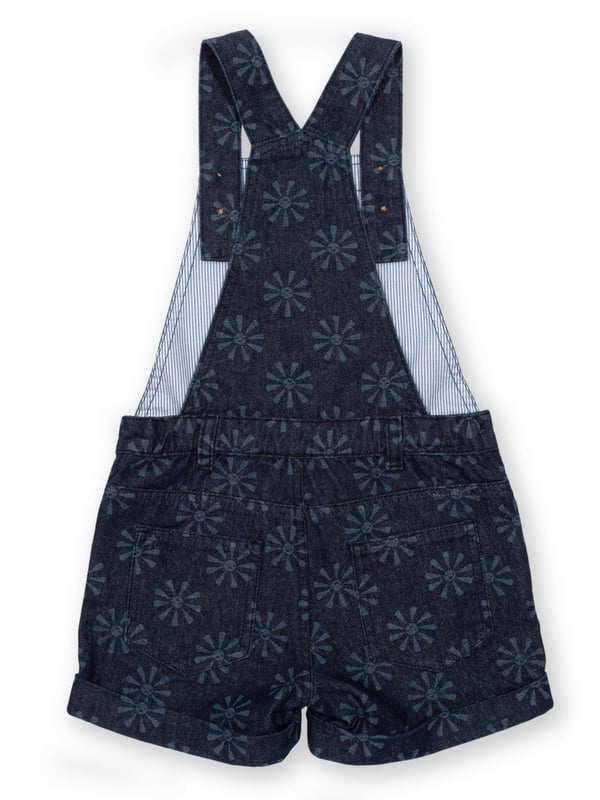 100% organic cotton |  Light navy etched smiley sun design |  Navy blue |  Lightweight denim fabric |  Apple enzyme washed for a soft hand feel |  Adjustable straps with coconut buttons |  Coconut button side fastenings |  Side, back and front bib pockets |  Short legs |  With turn-ups |  Made in Turkey |  Machine washable at 40 degrees, or at 30 degrees to be kinder to the planet