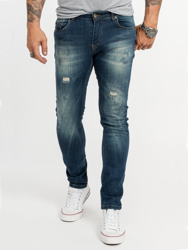 Ein Klassiker für Arbeitsalltag, Freizeit und Urlaub ist die Blue Jeans im Regular  Fit! Viele unserer hell- bis dunkelblauen Herren Jeans gefallen mit coolen Waschungen im Used-Look. Die lässig sitzenden Hosen verfügen über gerade geschnittene Beine, das typische 5-Pocket-Design und ein Rock-Creek Patch. Neben praktischen Bundschlaufen besitzen sie einen Verschluss mit Knöpfen oder Zipper. Unsere Herren Jeans bestehen zu 100% aus Baumwolle oder haben einen hohen BaumwollAnteil. Bei einigen Modellen sorgt ein Stretch-Anteil für die perfekte Passform.