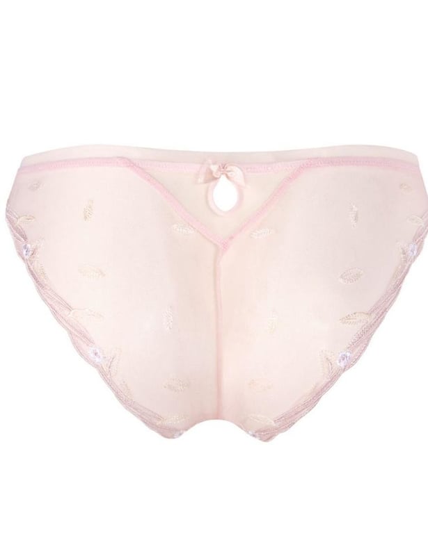 Lise Charmel Frisson Vegetal Italian Brief Feel flawless, comfy and elegant in this luxury brief from Lise Charmel. Known for its luscious fabrics, Lise Charmel have delivered another stunning collection of premium French lingerie. This Italian style brief has a sensual cut to reveal a little more. The front has a slight dip at the waist and the back is cut high at the legs for slightly less rear coverage. The front is decorated with delicate tulle and embroidery while the back is finished with a luxury satin bow.
Premium Italian style brief
Soft luxury fabrics
Some rear coverage
Composition: 61% Polyamide | 15% Elastane | 14% Cotton | 10% Polyester
Listed in UK sizes
Italian Brief