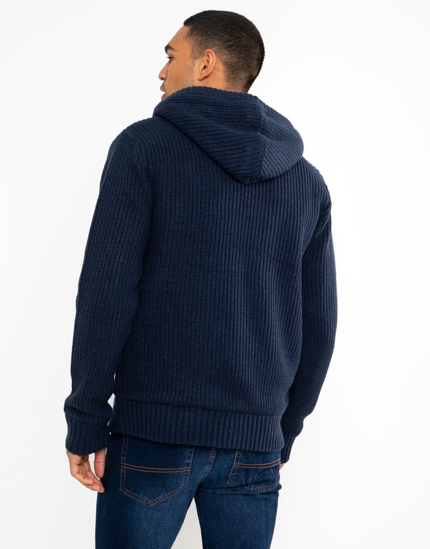 This zip through, knitted hoody from Threadbare features a cable knit design, has a cosy borg lining and two side pockets. Perfect for keeping warm this season. Other colours and similar styles available.