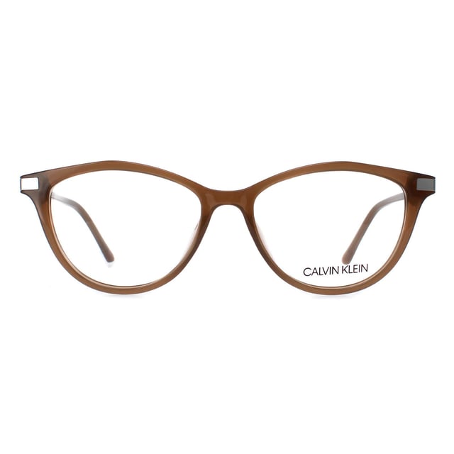 Calvin Klein Cat Eye Womens Milky Taupe CK19531  Glasses are a feminine cat eye style made from lightweight acetate. They feature the Calvin Klein branding on the temples for brand authenticity.