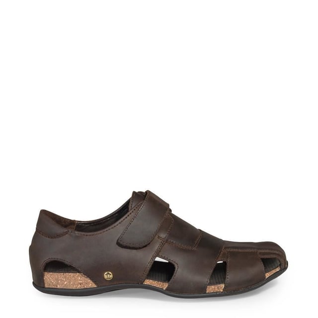 Step into comfort and style with our Panama Jack Men's Leather Sandals, the Fletcher Basic. Crafted for the adventurous soul, these half-open shoes offer a perfect blend of functionality and fashion. Experience unmatched comfort and durability with the Velcro Closure and natural greased nappa leather construction. Enjoy a luxurious feel with leather lining and anatomical insole, providing support and cushioning for all-day wear. Navigate any terrain with confidence, thanks to the flexible and durable TR rubber sole, ensuring stability and grip on outdoor adventures. Bullet Points: Velcro Closure for easy and adjustable fitNatural greased nappa leather construction for durability and styleLeather lining for luxurious comfortAnatomical insole for added supportFlexible and durable TR rubber sole for stability on various surfaces