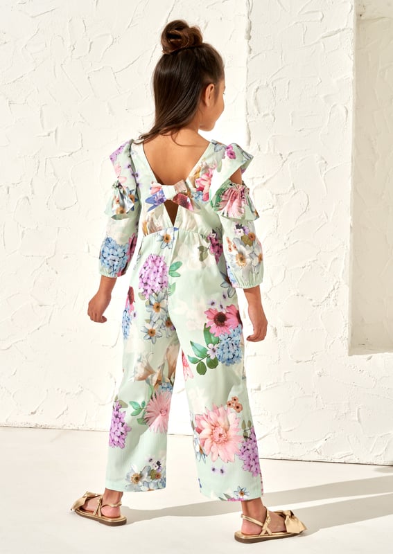 Channel effortless style in our new oversize floral print wide leg jumpsuit in soft  . Featuring a stunning ruffle open shoulder detail it's the perfect dress alternative.. About Me: 100% Polyester. Look After Me: Think Planet. Wash At 30C.