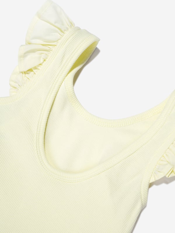 A cute and functional design, this girls Ranja top in yellow is a piece she will want to wear repeatedly. Depicted by Danish brand Molo, it features cut out ruffle sleeves and a scoop neck. Stylish and practical, she will look effortlessly fabulous.  Ruffle Design  Sustainable Scoop Neck