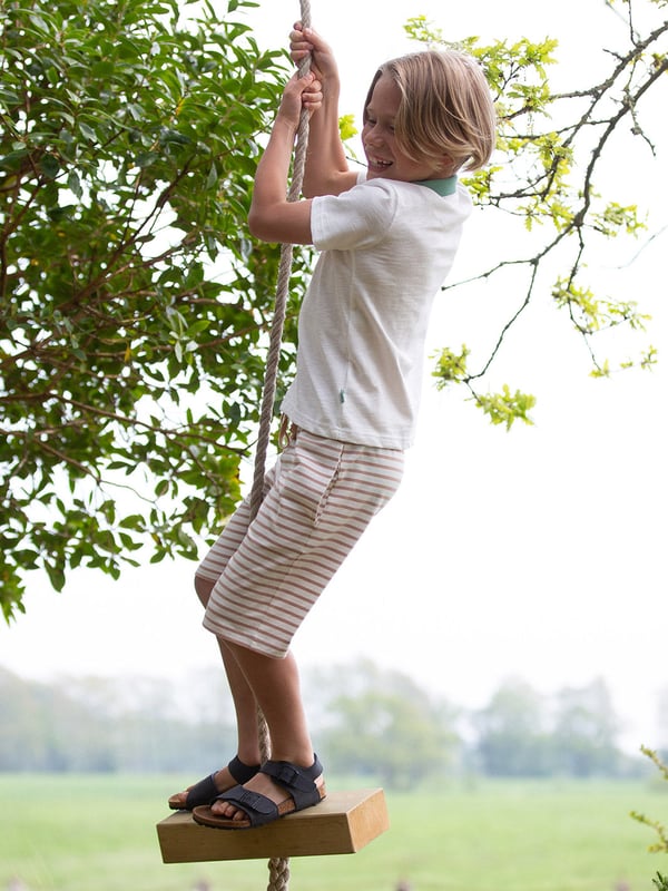 95% organic cotton 5% elastane | Proud to be certified to the Global Organic Textile Standard (GOTS) | Buff and cream yarn dyed stripe | Single jersey with a little bit of stretch (180-190 gsm) | Side pockets | Elasticated waistband with adjustable ties | Made in Turkey | Machine washable at 40 degrees, or at 30 degrees to be kinder to the planet