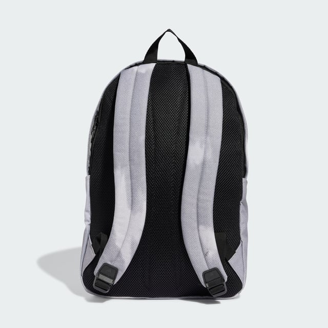 Weaving through city streets or escaping to the countryside, the adidas backpack makes a stylish yet practical choice. Padded, adjustable straps and a breathable mesh back panel ensure carrying comfort wherever the day takes you. Multiple pockets, inside and out, provide storage for life's essentials. This product is made with at least 50% recycled materials. By reusing materials that have already been created, adidas help to reduce waste and our reliance on finite resources and reduce the footprint of the products adidas make.  - Dimensions: 14.5 cm x 31 cm x 45 cm - Volume: 20.2 L - 100% polyester (recycled) - Mesh back panel and strap backing - Front zip pocket - Slip-in side pockets - Inner slip-in pocket - Padded adjustable shoulder straps - Carry handle  Shipped by adidas