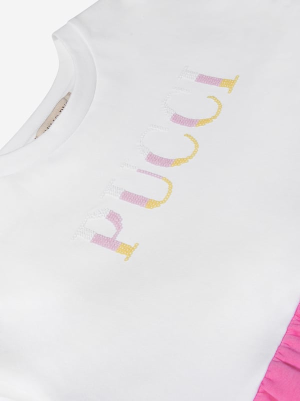 Perfect for playtime and beyond, this girls' dress from luxury label Emilio Pucci is the perfect addition to mini wardrobes this season. In a soft jersey with a round neckline and long sleeves, the pink skirt is paired with a frill detail and iconic 'Pucci' logo detail.
