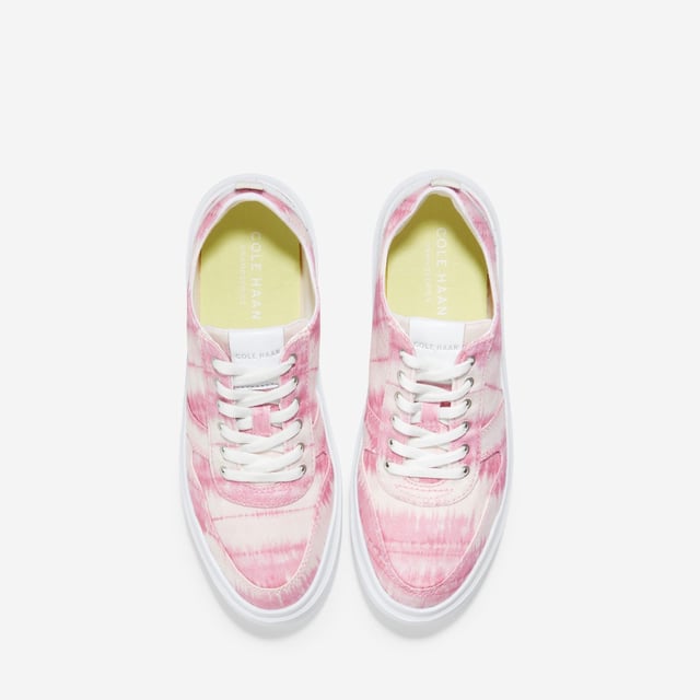 We've given our much-loved, signature GrandPro Rally Court Sneaker an update in organic canvas. Crafted from high-end-yet-durable materials, it features a luxuriously cushioned GRANDFOAM footbed, an EVA outsole, and a classic old-school sneaker vibe