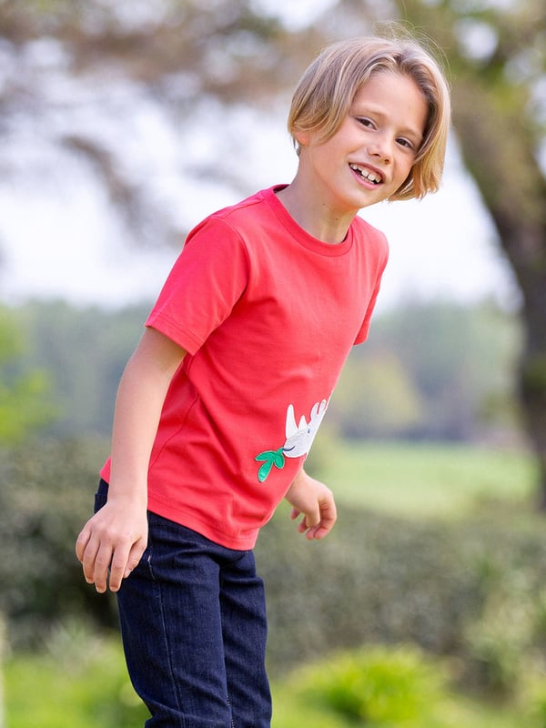 100% organic cotton | Proud to be certified to the Global Organic Textile Standard (GOTS) | Rhino and bird appliqué design | OEKO-TEX Standard 100 (Product class I) appliqué backing | Red | Single jersey (180-190 gsm) | Popper shoulder opening (up to and including size 3 years) | Short sleeved | Round neck | Made in Turkey | Machine washable at 40 degrees, or at 30 degrees to be kinder to the planet