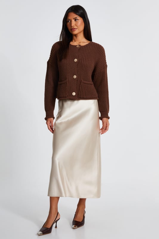 - Knitted finish - Round neckline - Button front - Relaxed fit - Model height: 5'8" - Model wears uk 8 / us 4 / eur 36 - Always check the wash care label - Cool hand wash with mild detergent