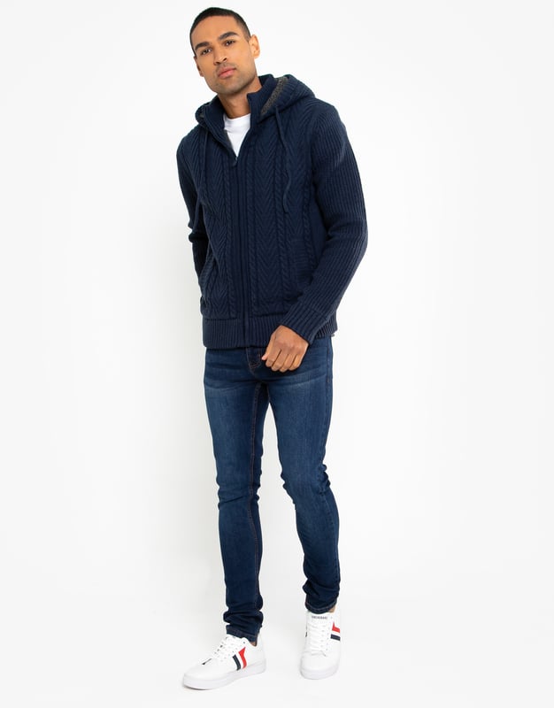 This zip through, knitted hoody from Threadbare features a cable knit design, has a cosy borg lining and two side pockets. Perfect for keeping warm this season. Other colours and similar styles available.