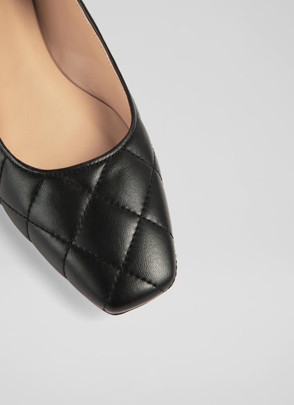 LK Bennett Carolina Flats, Black Every wardrobe needs a chic pair of flats, and our Carolina ballerinas have an elegant feel thanks to their classic quilting. Crafted in Spain from black quilted nappa leather, they have a square toe, a sleek silhouette and a slight heel. Wearable and with minimalist appeal, pair them with tailored trousers or jeans for an understated everyday look.