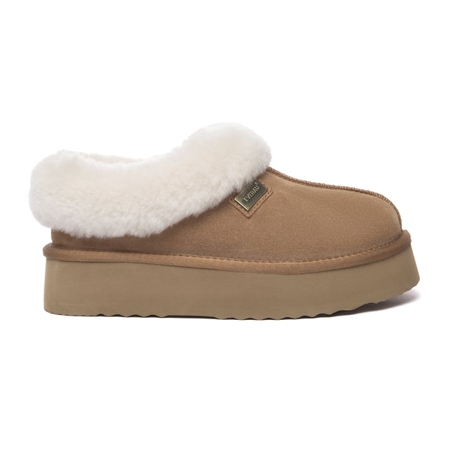 Stay snug and stylish in the timeless Topknot Ankle Slippers, the latest essential footwear with a trendy platform design. Crafted in five chic colour options, these slippers envelop your feet in luxurious sheepskin wool, offering irresistible comfort. Complete with a fluffy wool ankle collar, their enduring charm ensures they remain in vogue across seasons.

Product No. EAU2017

Description:
- Cow Suede Upper
Sheepskin Wool Insole and Lining
- EVA Sole