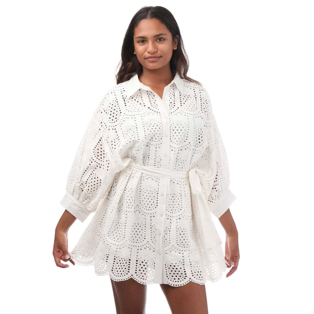 Women's Sundress Florine Short Dress in White.- Classic collar.- Flared sleeves.- Button fastening.- Shirt cuffs.- Pineapple eyelet patterned fabric.- Seperate belt to tie.- 100% Cotton. Ref: S24042.