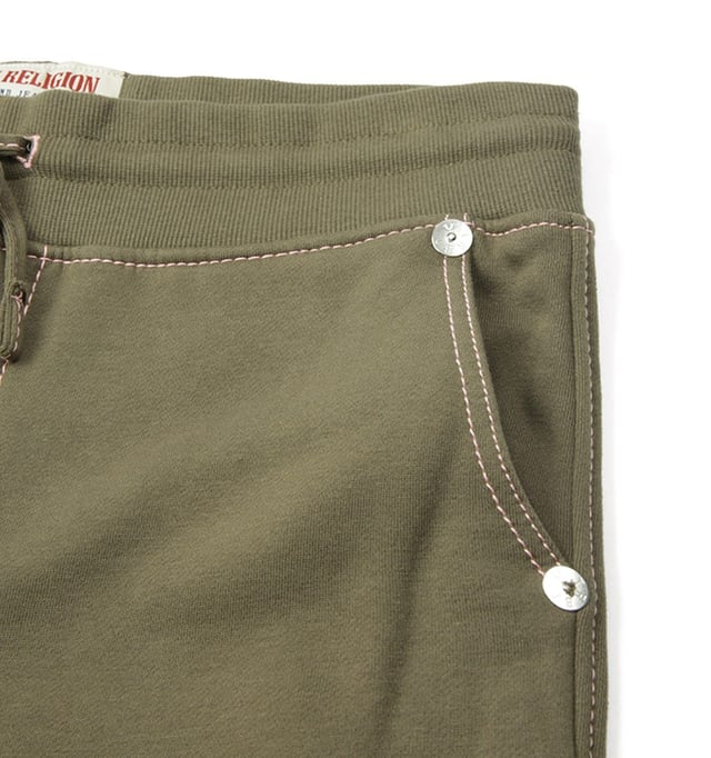 Showcasing their iconic Big T stitching  these classic joggers from True Religion boast a bold and stylish look. Crafted from a soft cotton blend with a brushed inner offering day-long comfort. Featuring an adjustable drawstring waist  side slip pockets  a rear patch pocket and elasticated cuffs. Finished with the iconic Horsehoe logo Big T stitched on the rear pocket.-Regular Fit-Soft Cotton Blend-Adjustable Drawstring Waist-Twin Side Seam Pockets-Rear Patch Pocket-Elasticated Cuffs-True Religion Branding. Material: 80% Cotton, 20% Polyester. Ref: SS231057553052.