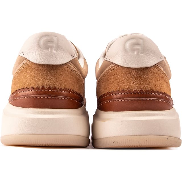What A Fab Sneaker - The Court-style Crossover Trainer From Cole Haan Has A Superior Leather Upper Combined With The Distinctive, Sporty Grand 360 Sole. The Blind Eye Lacing System And Lightweight Fit Ensure A Steady Step, While The Retro-inspired Design And Cushioned Eva Footbed Allow For Greater Flexibility, A Softer Ride And Stylish Looks. All-day Comfort Has Never Looked Better.