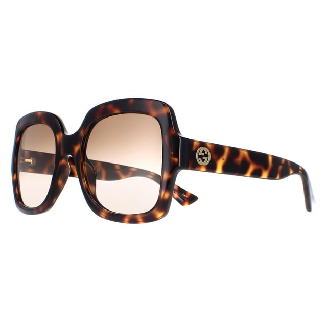 Gucci GG1337S 003 havana bruin gradiÃ«nt zonnebril is een modieus en tijdloos accessoire dat elke outfit zal verheffen. Deze zonnebril heeft een vierkante, retro vorm met een lichtgewicht acetaat montuur en het iconische GG logo op de slapen. Perfect voor iedereen die op zoek is naar een vintage-geÃ¯nspireerd accessoire dat luxe en stijl uitstraalt. Deze zonnebril is een must-have voor elke fashion-forward persoon.