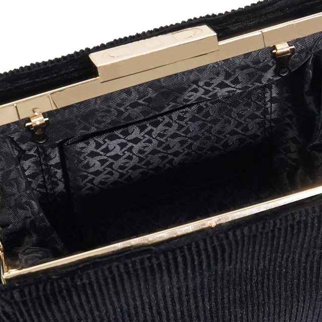 This elegant mid-size frame clutch bag comes with a little extra depth to accommodate more of your evening essentials.  Opening via a gold logoed clasp Eclipso features a handy side slip pocket and monogrammed lining, this sleek style will add a sophisticated touch to evening outfits.