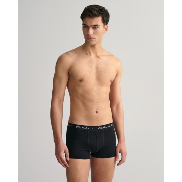 A three-pack of trunks crafted in cotton jersey with a hint of stretch. Cut in a close fit with a short leg length and a regular waist, these trunks come in solid, basic colors and are detailed with repeating GANT logos at the elastic waistband.


Close fit
Short leg length
Regular waist
Jacquard knitted waistband



Material: Cotton 95%, Elastane 5%
900013003

 