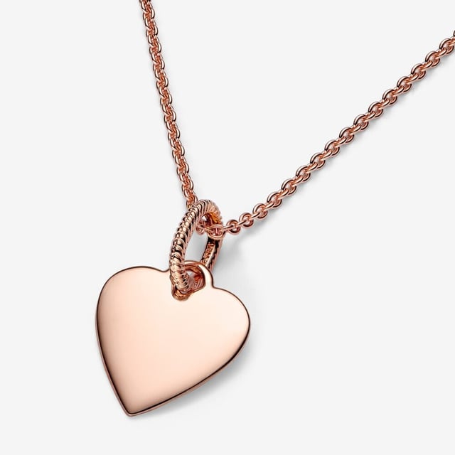 This Pandora Pendant in Rosegold is made of the highest quality allergy free Gold Plated Metal. The Pandora 'Engravable Heart Tag' Women's Gold Plated Metal Pendant - Rosegold 388914C00 comes delivered in a beautiful gift box and has a two year warranty - the perfect gift to spoil yourself or a loved one.