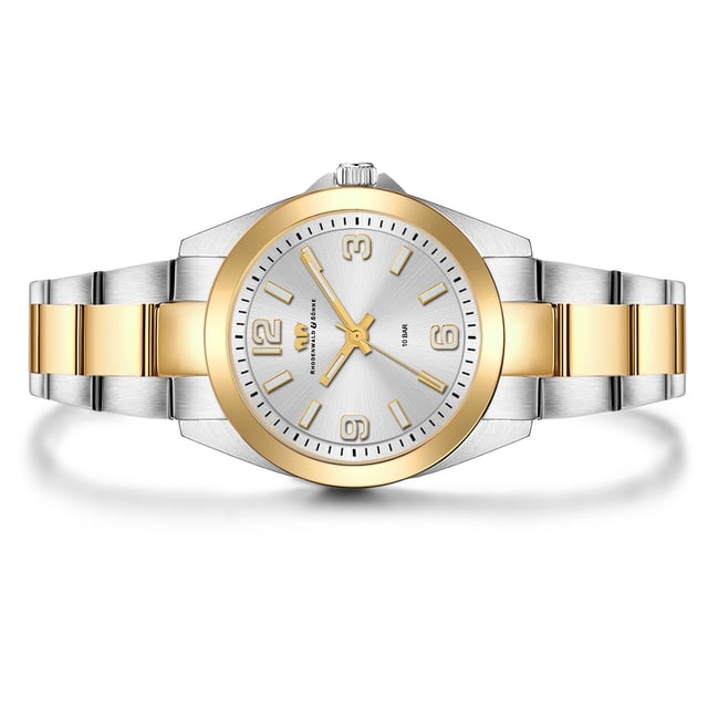 Are you looking for a clock with a timeless design, combined with excellent quality? Then this timepiece of the Rhodenwald & Sons brand is a good choice: the watch manufacturer stands for stylish and sustainable masterpieces for all generations. The women's model convinces with a reserved dial, minimalist line indices, Arabic numbers, minuteery and luminiscant staff. The robust stainless steel housing and a suitable link bracelet made of partially yellow-gold stainless steel rely on the trendy bicolor look. A long-lasting quartz clock, a screwed housing floor and waterproof up to 10 ATM complete the premium equipment.