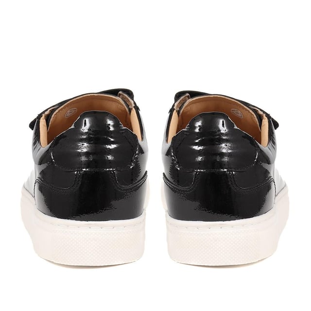Flavia brings glossy finesse to the trainer game, pairing patent leather with everyday wearability. Elevate your stride; these are more than just trainers, they're a statement.