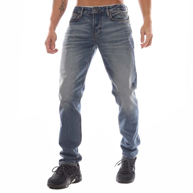 Mens Emporio Armani J06 Slim-Fit Washed Jeans in blue.- Five-pocket styling.- Zip fly and button fastening.- Belt loops.- Leather brand patch.- Metal rear pocket eagle.- Slim fit.- 99% Cotton  1% Elastane.- Ref: 6D1J061D67Z942