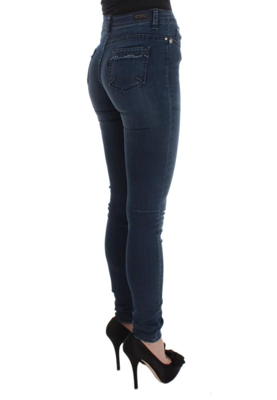 Jeans CoSTUME NATIONAL CNC de corte Slim Fit con detalles de logo  
  Nuevos con etiquetas  
  100% auténticos  
  Estilo de corte ajustado  
  Color: Azul  
  Material: 74% Algodón 24% Nylon  
  Cierre: Cremallera y botón  
  Detalles del logo  