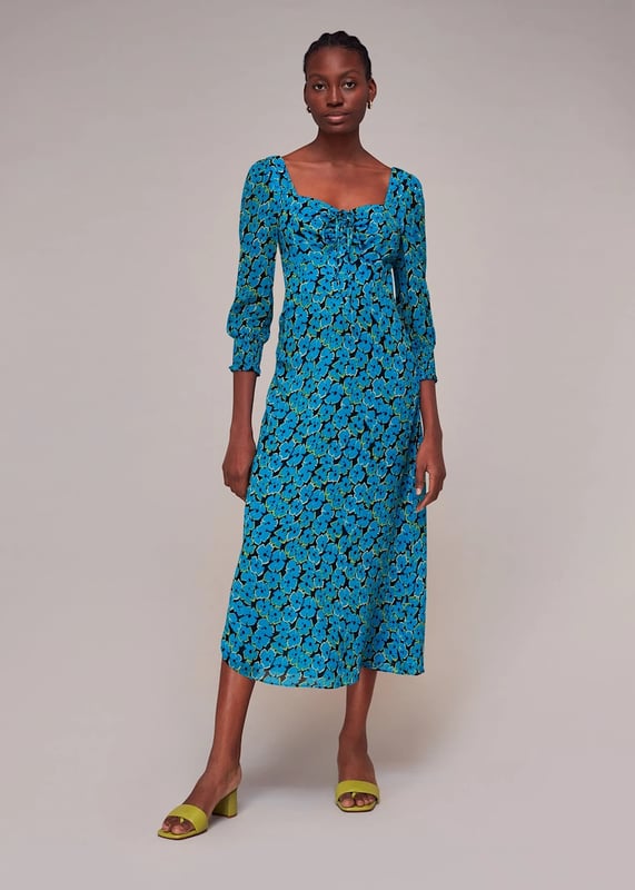 Bring charm and elegance to your wardrobe with the Farfalle Dress. Flaunt its vivid blue hues and delightful floral prints, designed with airy viscose. Perfect for any outing, its ¾ sleeves and comfortable shift silhouette invoke a demure yet playful narrative. Versatility meets allure in blue/multi.