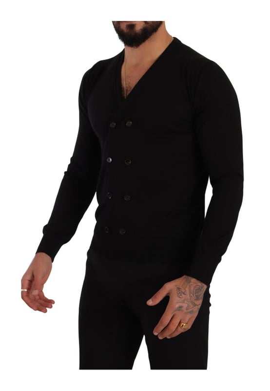 100% Authentic Dolce & Gabbana cashmere cardigan sweater
  Brand new with tags
  Button applique
  Straight cut
  Thick ribbed knit at the cuffs v-neckline and waistband
  Made in Italy
  Material: 100% Cashmere