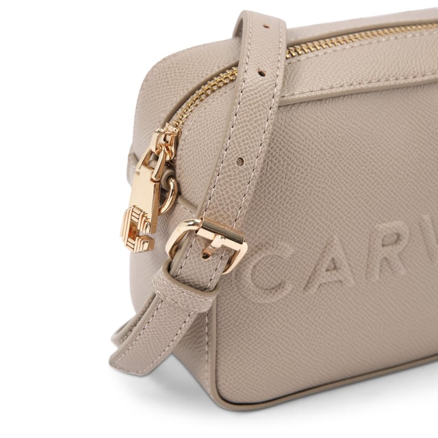 The Carvela Mini Frame Cross Body bag features a taupe textured exterior with embossed branding on the front. The bag is fastened with gone tone Icon C zipper. Dimensions: 12cm (H), 17cm (W), 6.5cm (D). Strap length: 126cm. Woven strap length: 119cm.