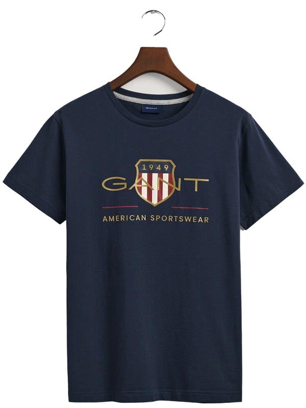 Mens Designer Gant Archive Shield T-Shirts feature Short Sleeves and a Crew Neckline. Gant Logo Printed on chest. Crafted With 100% Cotton, these Lightweight and breathable Regular Fit T-shirts are Machine Washable.