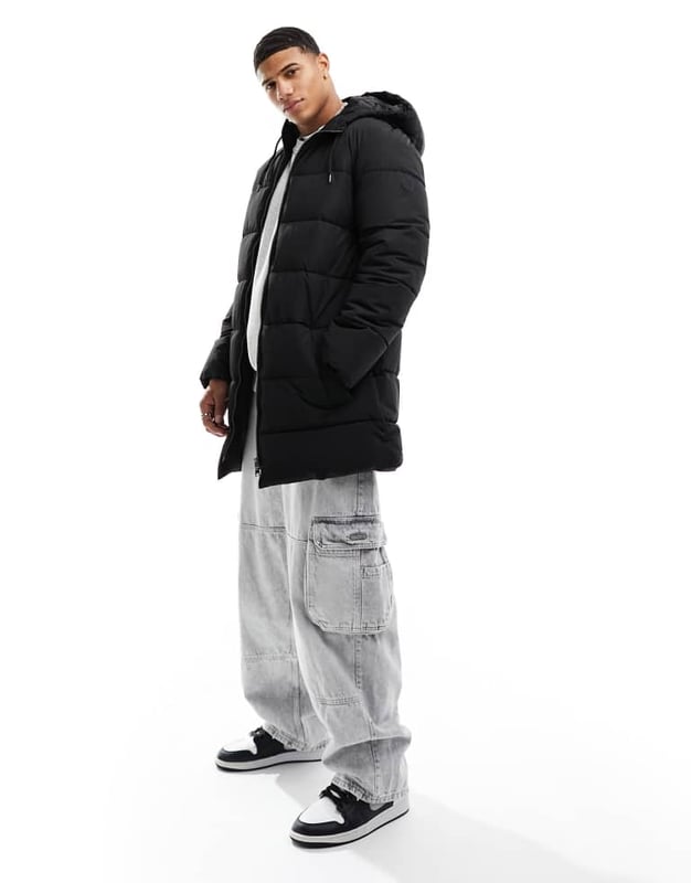ONLY & SONS longline hood puffer jacket in black Jackets & Coats by Only & Sons Head-to-toe warmth Toggle hood Zip fastening Side pockets Longline cut Regular fitSold By: Asos