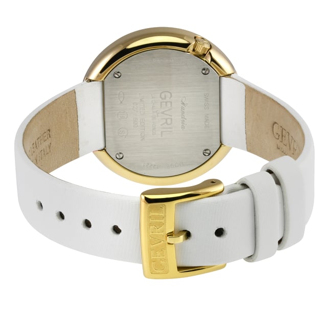 Gevril’s Swiss Diamond Watch from the Gandria Collection elicits a dreamy quality only known to those with a knack for nostalgia and an eye for elegance. It is beauty preserved, because true style never goes out of date.
The picturesque town of Gandria, with its lake views and surrounding mountains, is best known for its harkening to days gone by, and this absolute revelation of a timepiece captures that essence like no other. In a brilliant testament its moniker, Gandria features a 36mm round stainless-steel case in a warm bronze color that resplendently highlights a selection of beaded or diamond accents.  With either a half carat of 40 diamonds on the inner case or close to a carat of 108 diamonds on the outer case, each design forms two captivating concentric circles surrounding a serene and stylish mother of pearl dial and Roman Numeral endices.
Inaccessible by car, Gandria is untouched and unmarred by time, and Gevril’s Swiss Quartz movement proves that history this well-built needs no tampering.  Completed by a lustrous satin strap, tang buckle and hidden push/pull crown, this charming watch has a subtle ability to completely enthrall any room.
This collection exists in a world where modern luxury attempts to be loud, bold, yet Gandria stands out for being softly, authentically regal. An ode to a true, original beauty Gevril’s Gandria is a breathtaking classic for the ages.
Gevril 12221 Women's Gandria Swiss Quartz Diamond Watch Gevril Women's Swiss Diamond Watch from the Gandria Collection 36mm Round IPYG Diamond Case, White MOP dial 108 Diamonds on Outer Case, 0.84 TCW, Clarity VS, Color FG Hidden Push/Pull Crown, Roman Numeral Genuine Silver Satin Strap with Tang Buckle Anti-reflective Sapphire Crystal 5 ATM (50 Meters 165 Feet) Swiss Quartz Movement Ronda 762