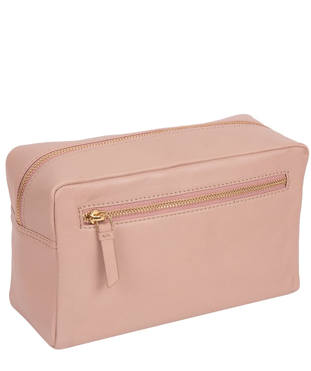 The 'Highgate' leather cosmetic bag is crafted from a luxurious smooth grain natural leather for a soft-touch and stylish finish. Features a zip-over top that conceals the central compartment lined with natural, untreated 100% cotton and has two internal slip pockets. Additional storage space is provided by a zipped pocket on the front of the bag. Finished with the iconic Pure Luxuries gold foil embossed logo and presented in a 100% cotton branded Pure Luxuries pouch.