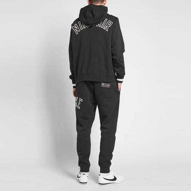 Nike woven tracksuit outlet set in black