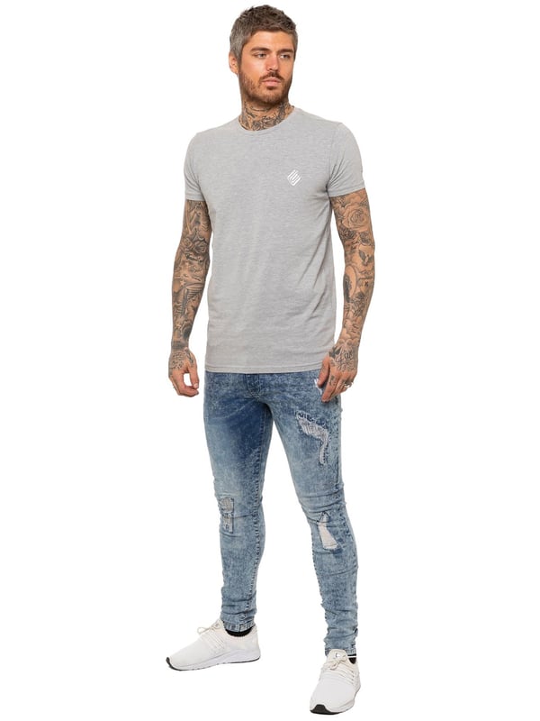 Enzo Mens Skinny Stretch rasgó los jeans angustiados. Efecto de rasgadura y reparación, cierre de mosca Zip. Dos bolsillos delanteros, dos bolsillos traseros, bolsillo de una sola moneda. Remaches y botones de marca.